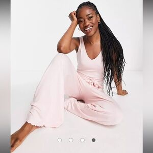 ASOS design lounge pale pink sleeveless jumpsuit with ruffle hem size 4